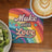 Coaster with "Make with Love" text on rainbow background next to coffee and kiwi.
