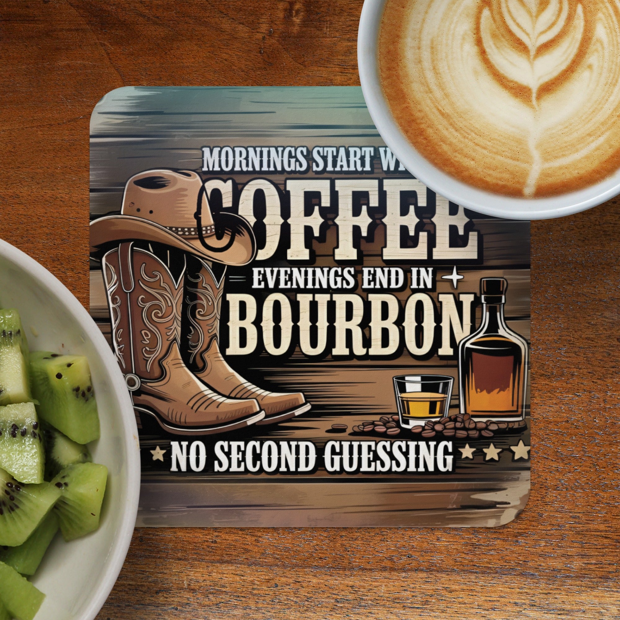 Coaster with cowboy boots, whiskey, and coffee text: "Mornings start with coffee, evenings end in bourbon. No second guessing."