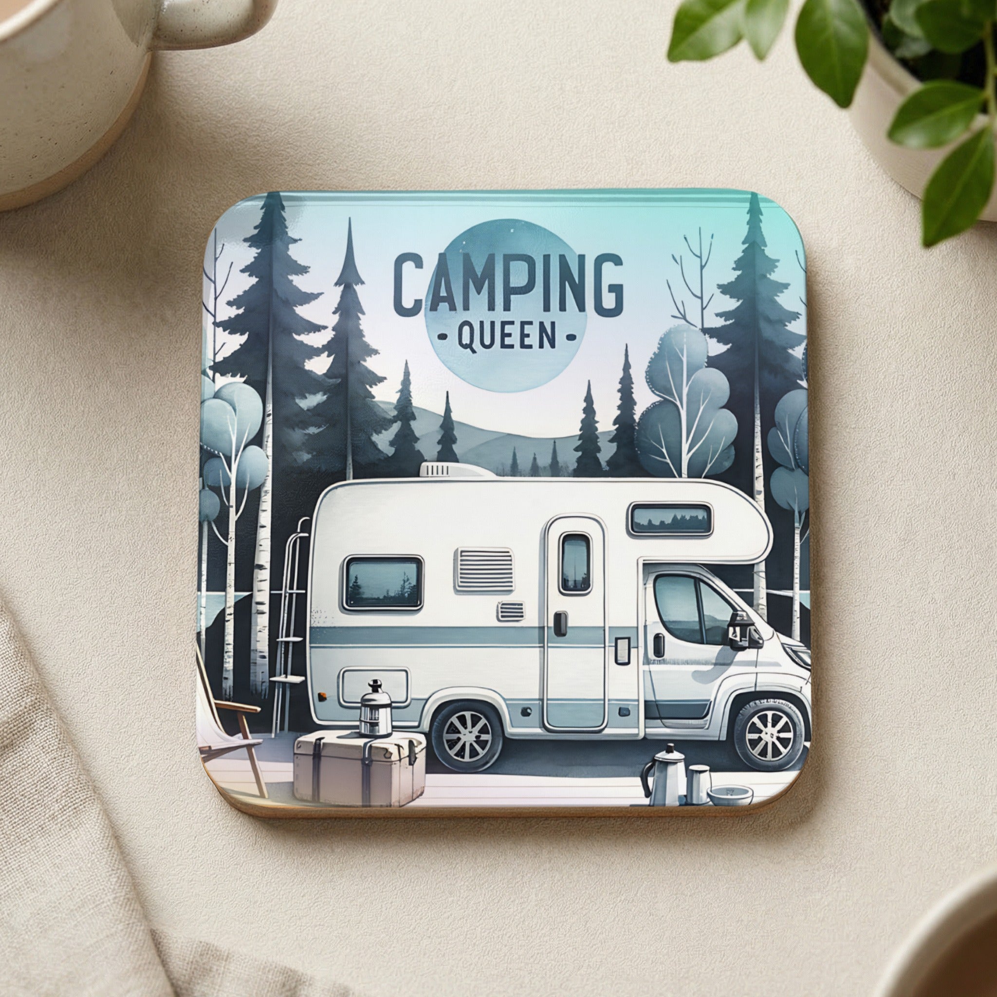 Camper queen RV in forest scene with trees and mountains, latte cup.