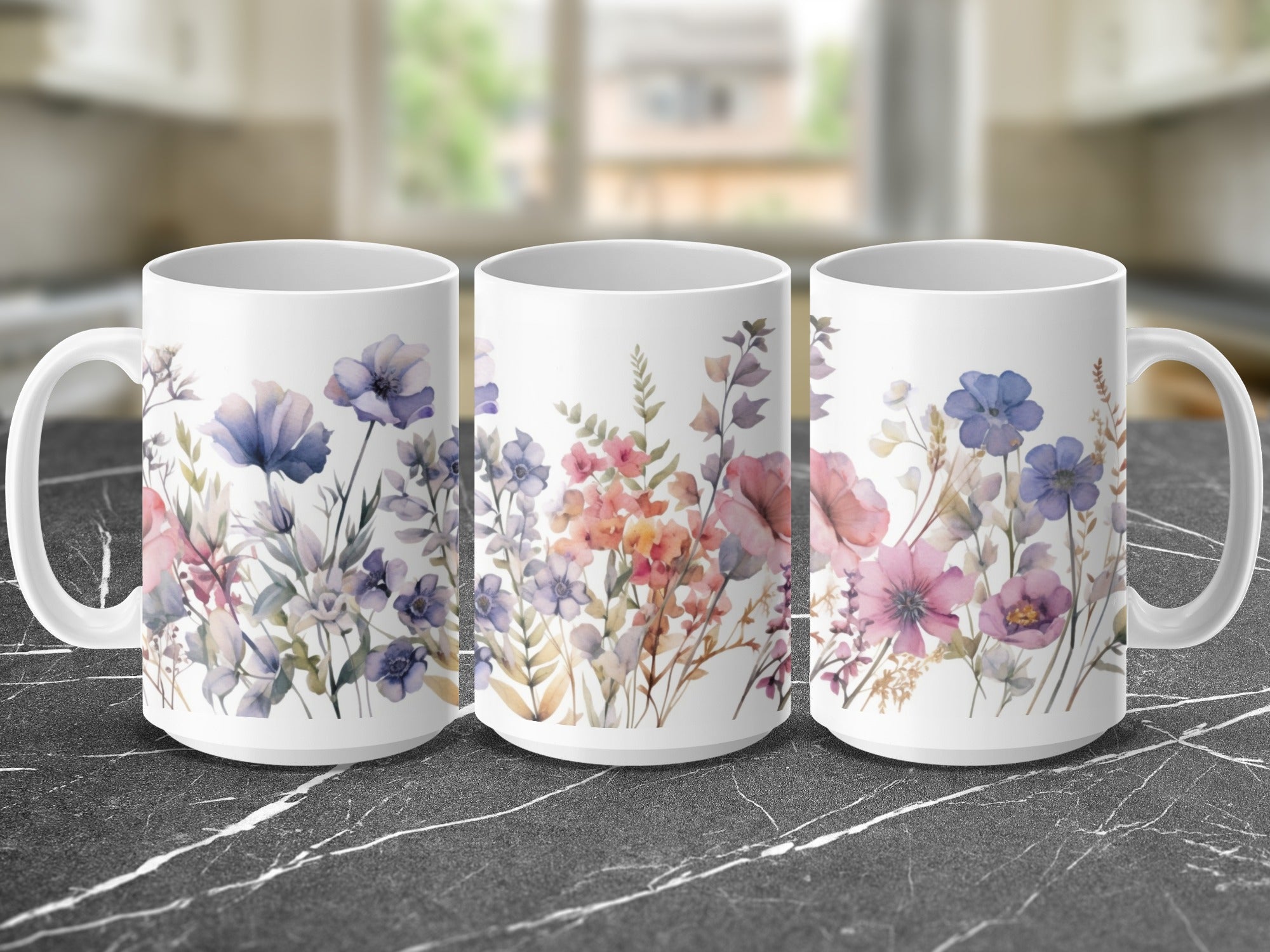 Three white mugs with watercolor floral designs, featuring purple, pink, and blue flowers.
