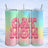 Pink paw print letters spell "CAT MOM" on a colorful gradient tumbler with a snowy background.