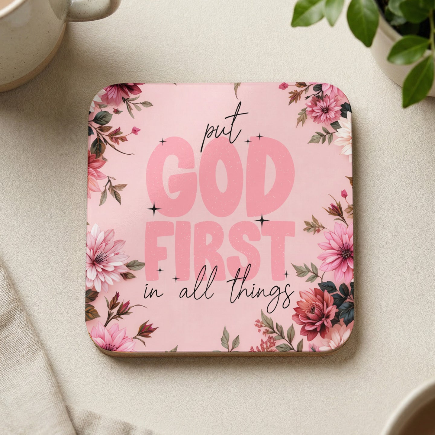 Square coaster with "put GOD FIRST in all things" text and floral accents.