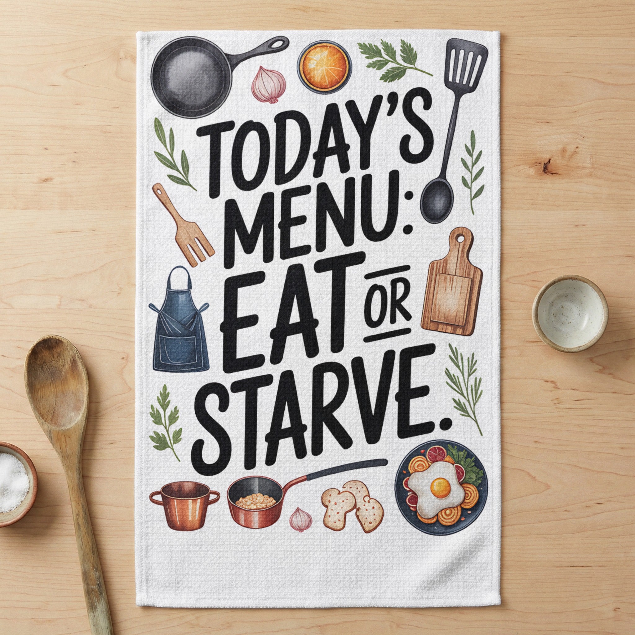 Kitchen towel with "Today's Menu: Eat or Starve" text and cooking illustrations.