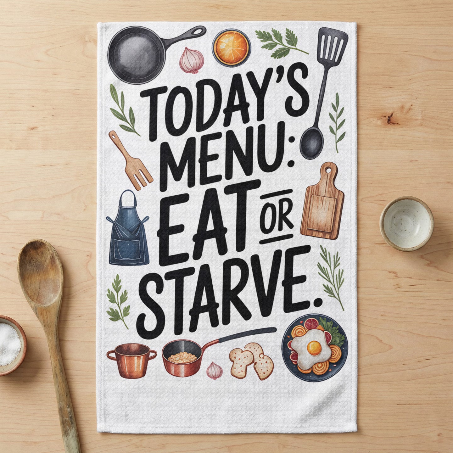 Kitchen towel with "Today's Menu: Eat or Starve" text and cooking illustrations.