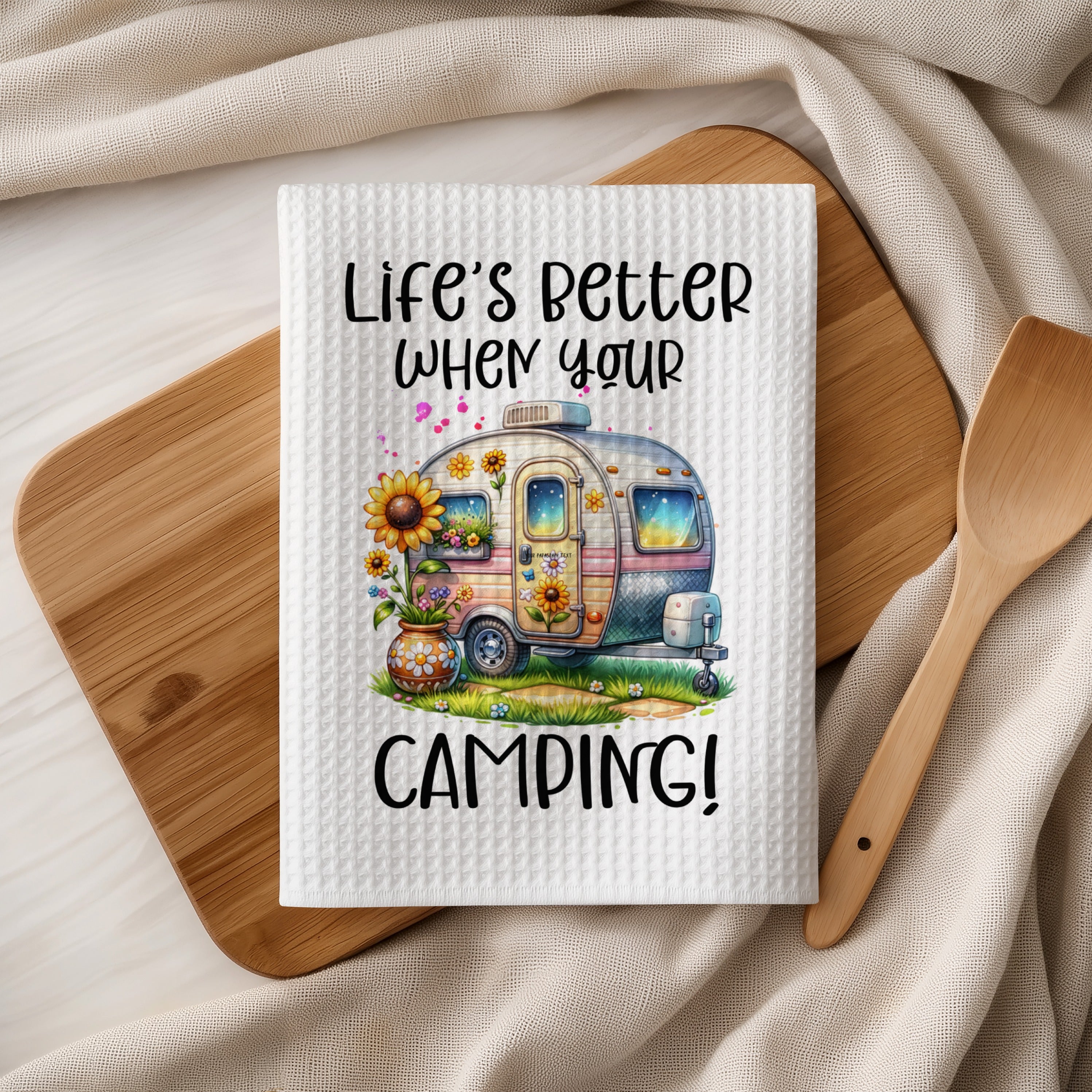 Towel with vintage camper, sunflowers, and text "Life's better when your camping."
