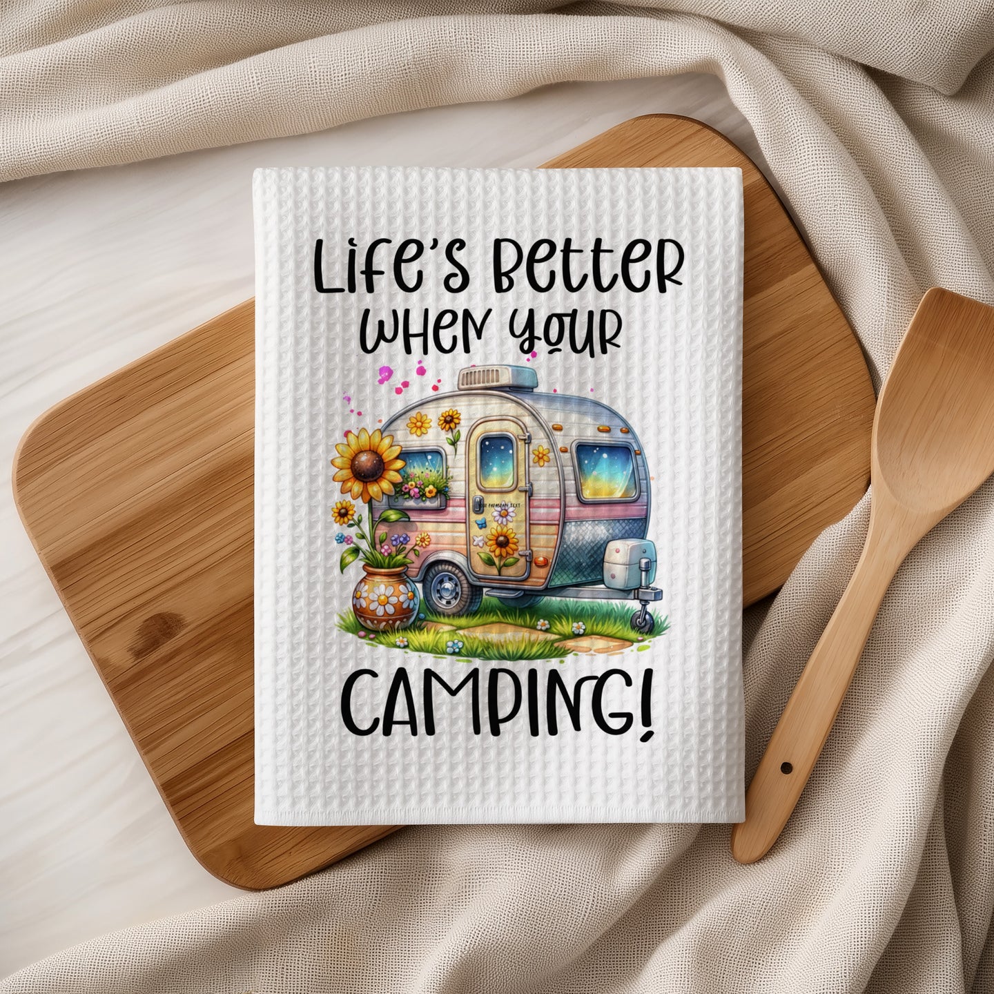Towel with vintage camper, sunflowers, and text "Life's better when your camping."