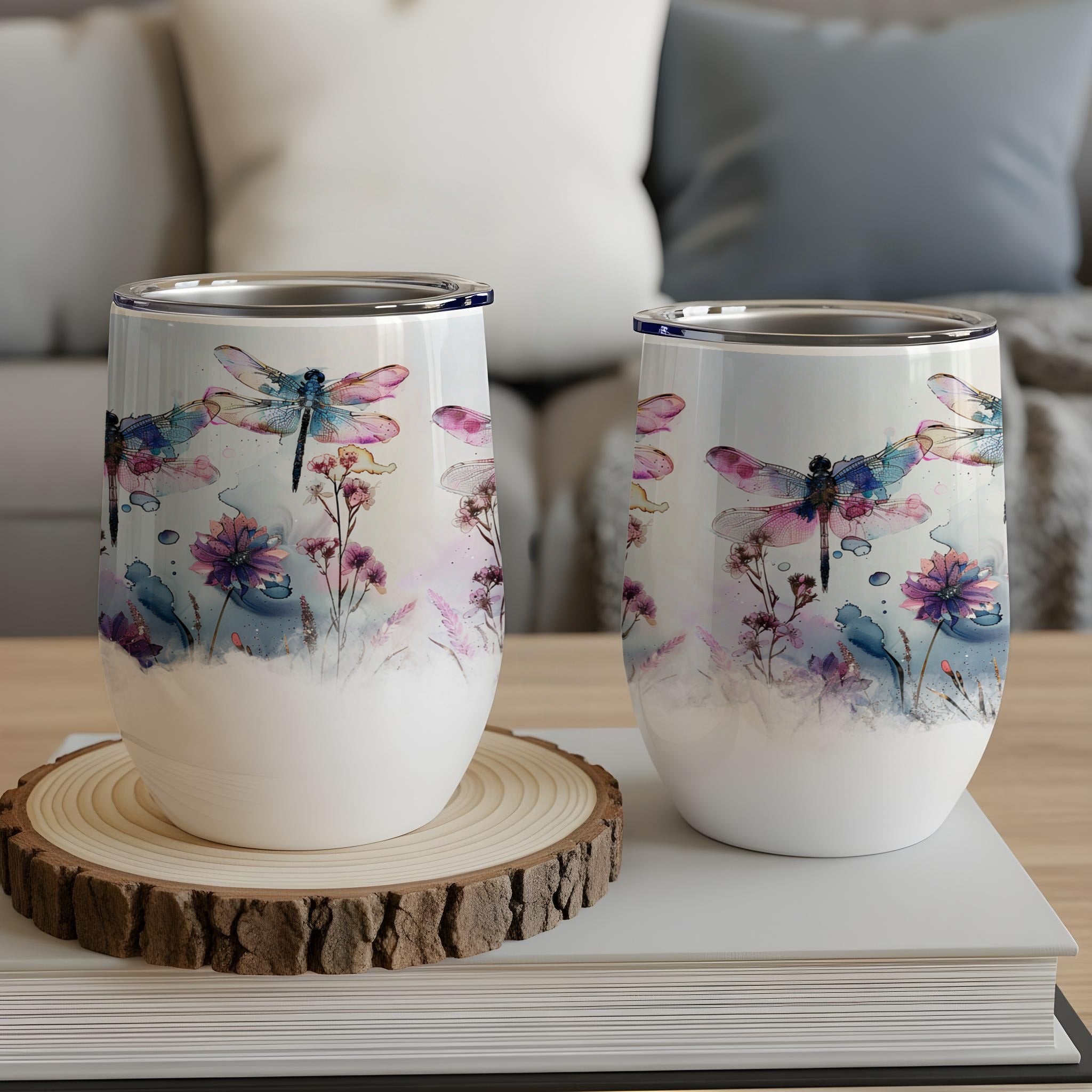 Two white insulated tumblers with dragonfly and floral watercolor design.