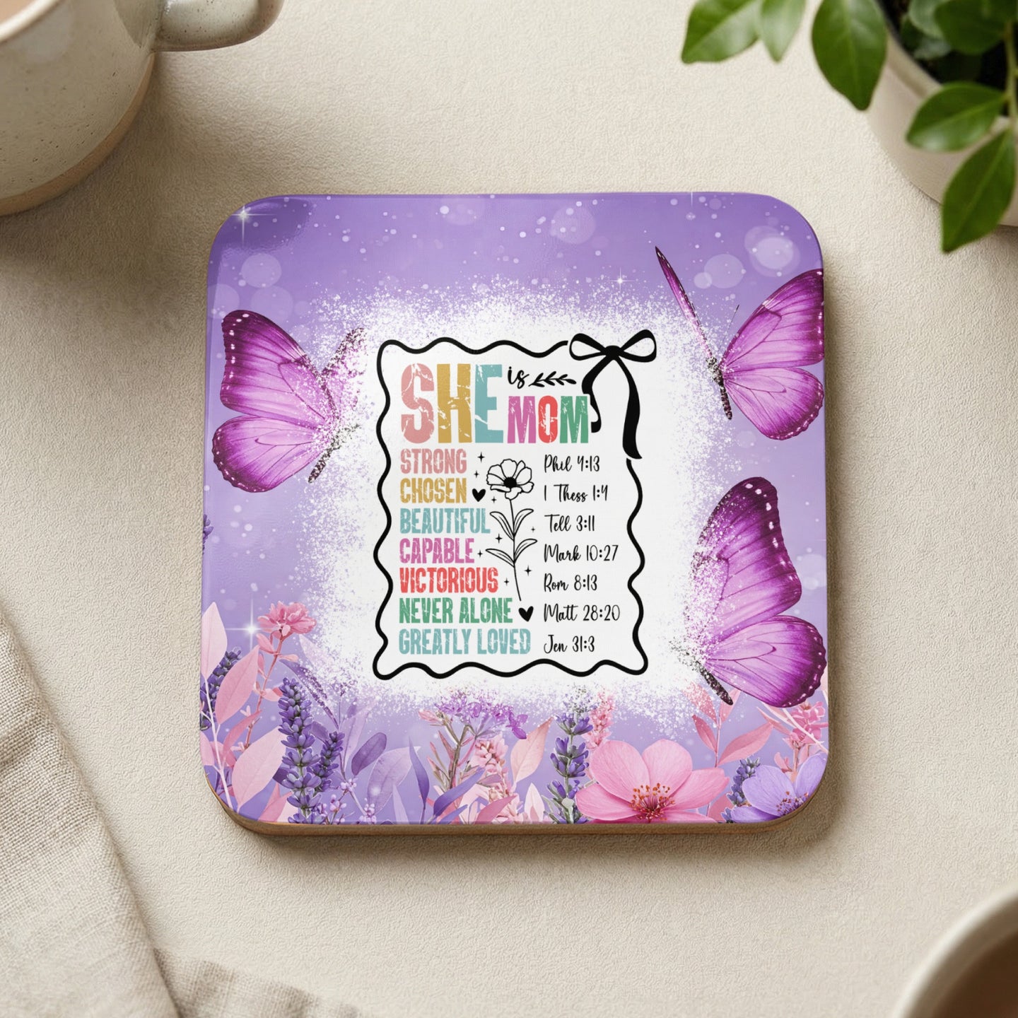 Coaster with "She is Mom" text and butterflies, featuring Bible verses.