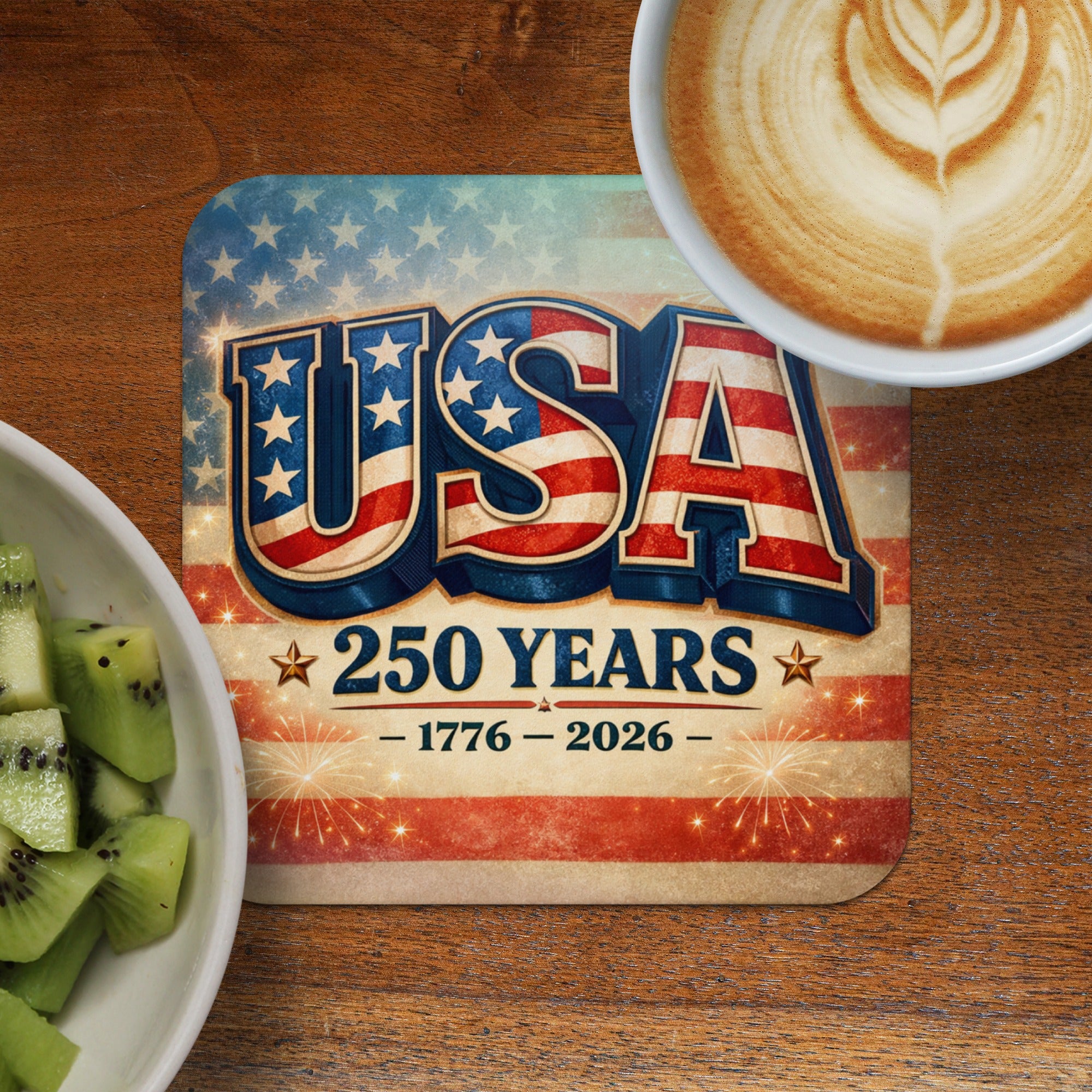 USA 250 Years 1776-2026 coaster with coffee and kiwi.