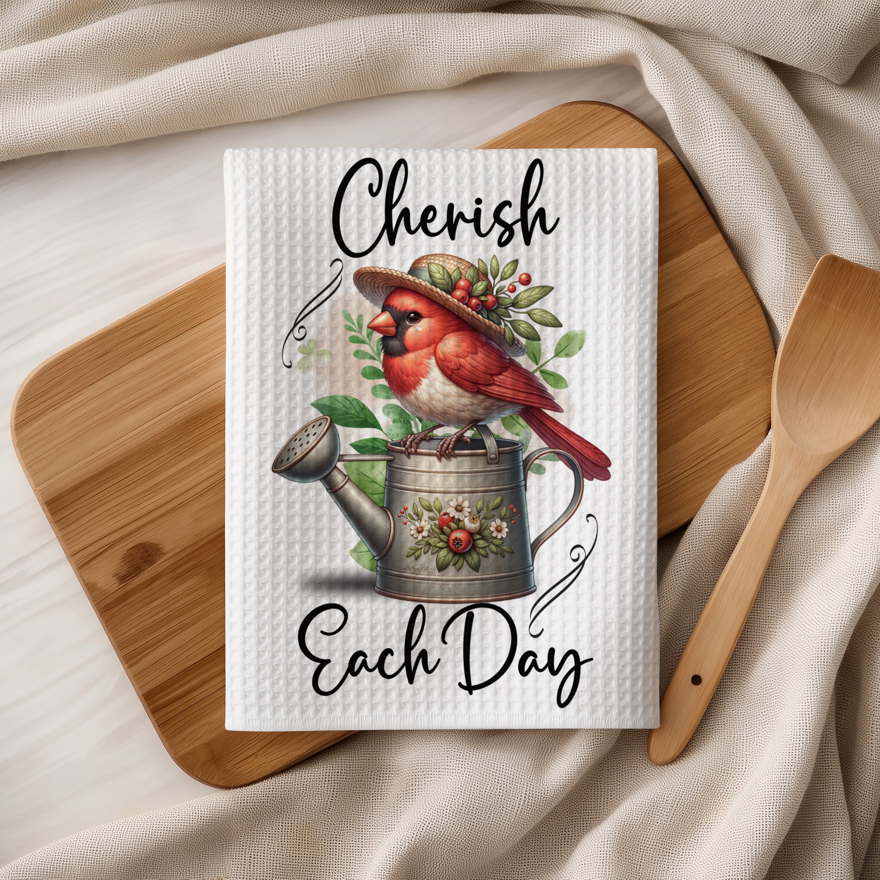 Cardinal bird wearing a hat on a watering can with text "Cherish Each Day".