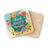 Coaster with "Think Happy Thoughts" text and colorful floral design.