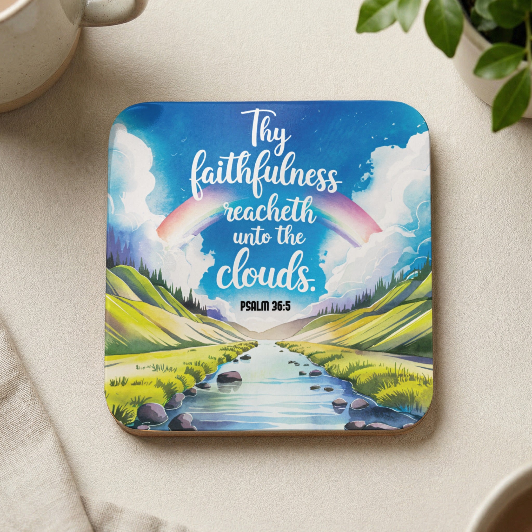 Square coaster with rainbow, river, and "Thy faithfulness reacheth unto the clouds. Psalm 36:5."