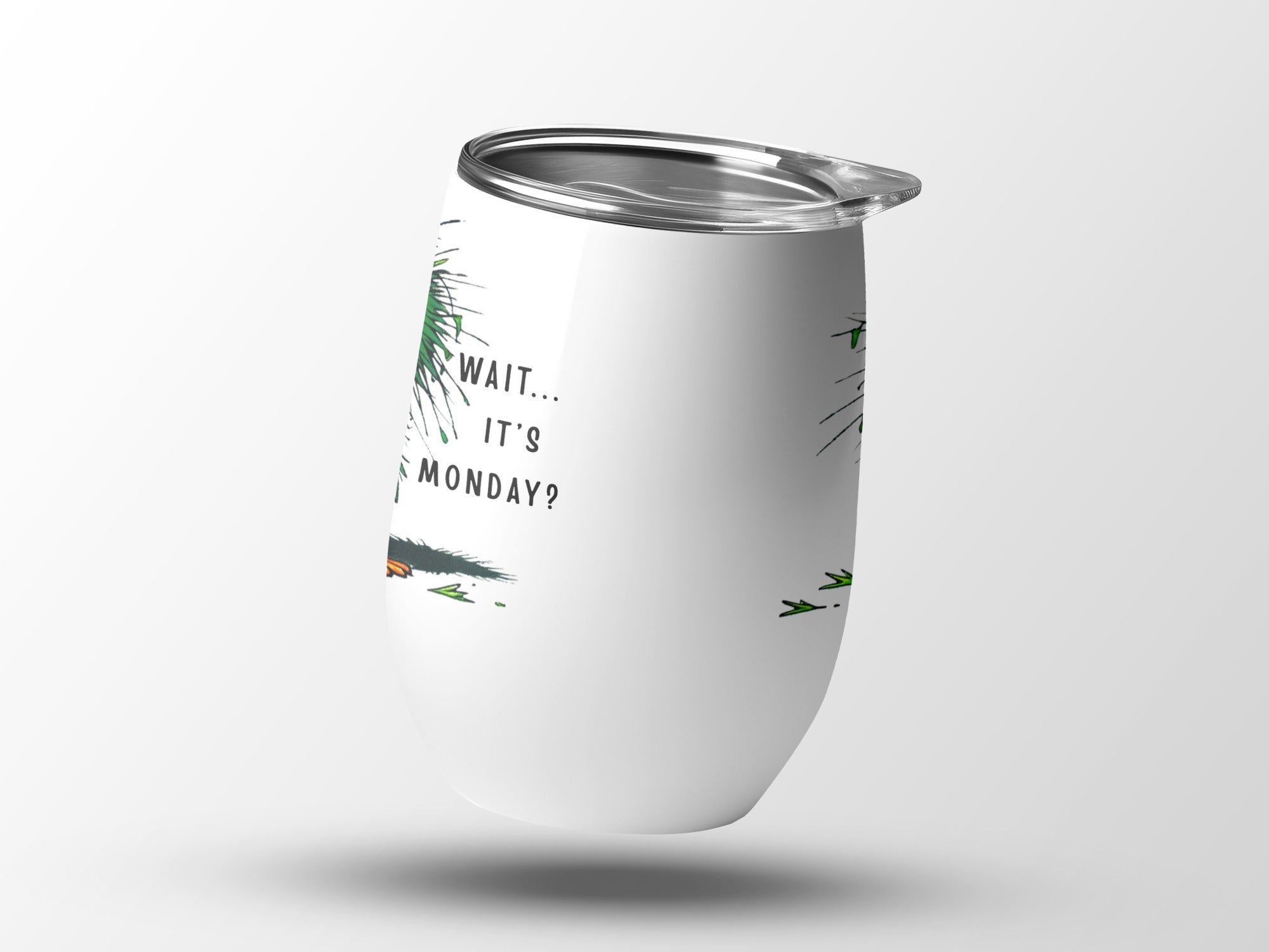 White tumbler with "WAIT... IT'S MONDAY?" text and palm frond graphic.