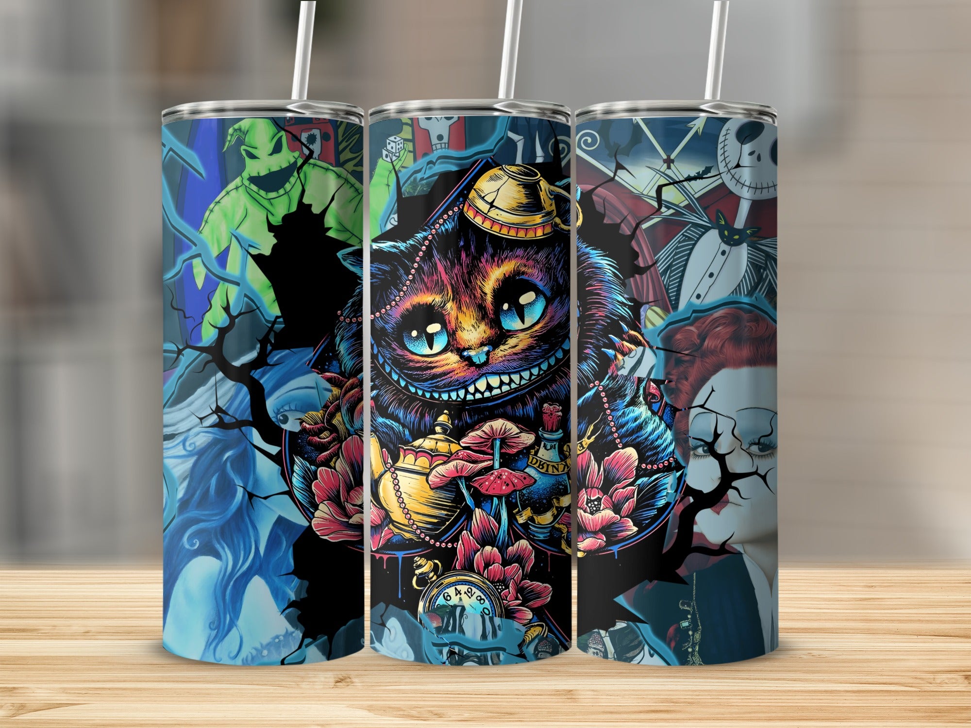 Cheshire Cat and horror characters on three travel tumblers.