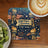 Coaster with Statue of Liberty torches, fireworks, and American flag.