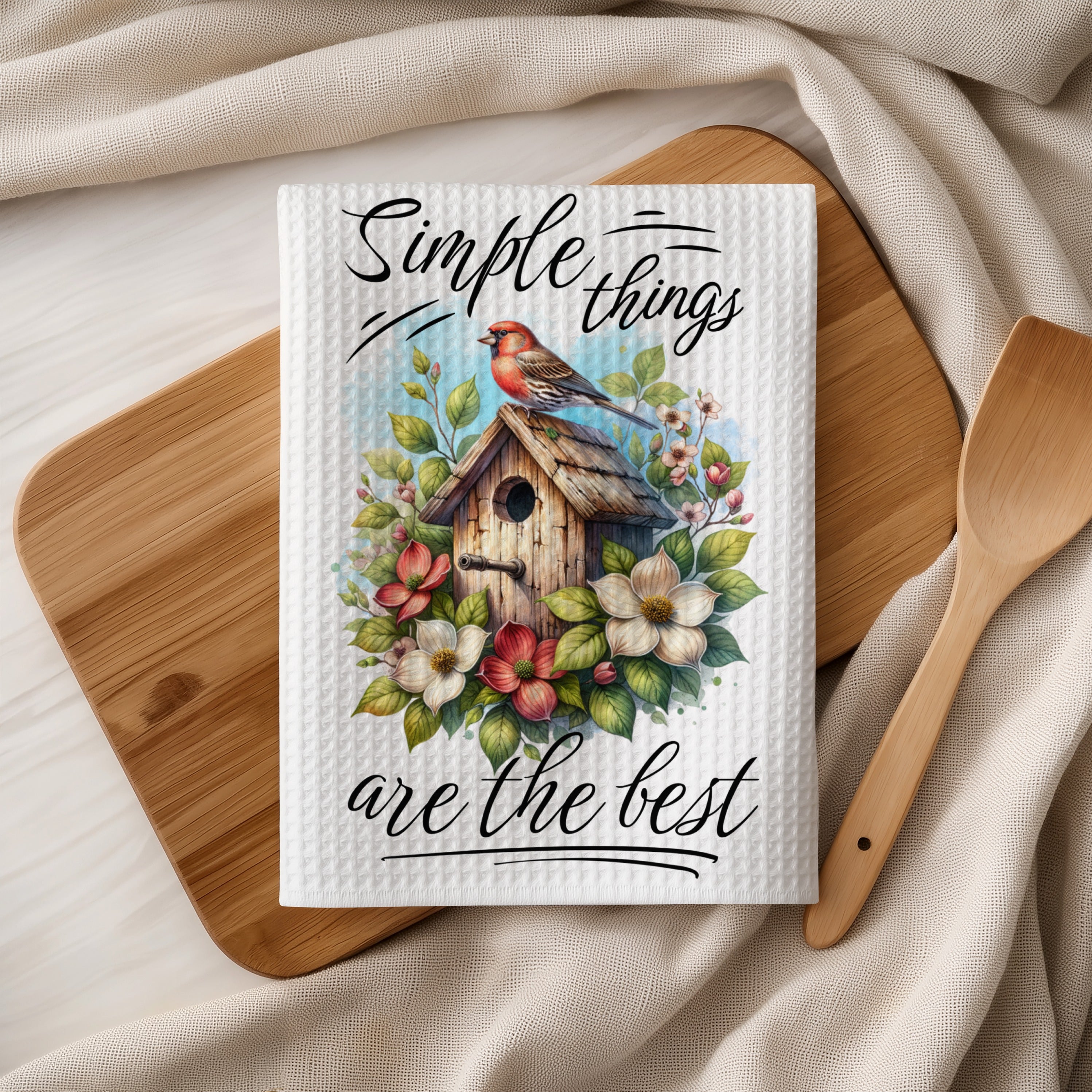 Dish towel with birdhouse and floral illustration, text "Simple things are the best."