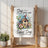 White tea towel with floral birdhouse and "Sing your own Sweet Song" text.