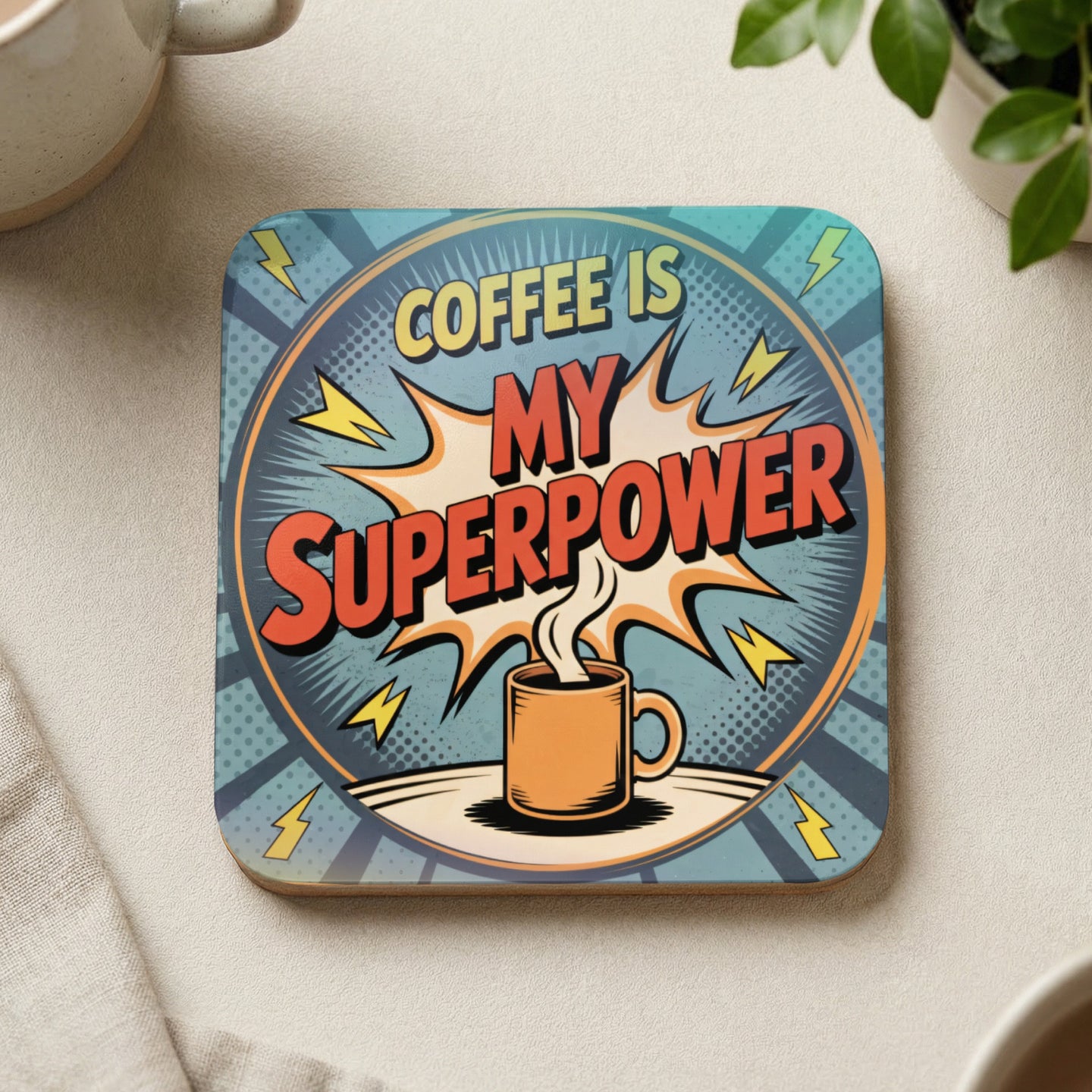 Coaster with "Coffee is my superpower" text and a steaming coffee mug.