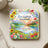 Coaster with floral border, lake, mountains, and inspirational quote.