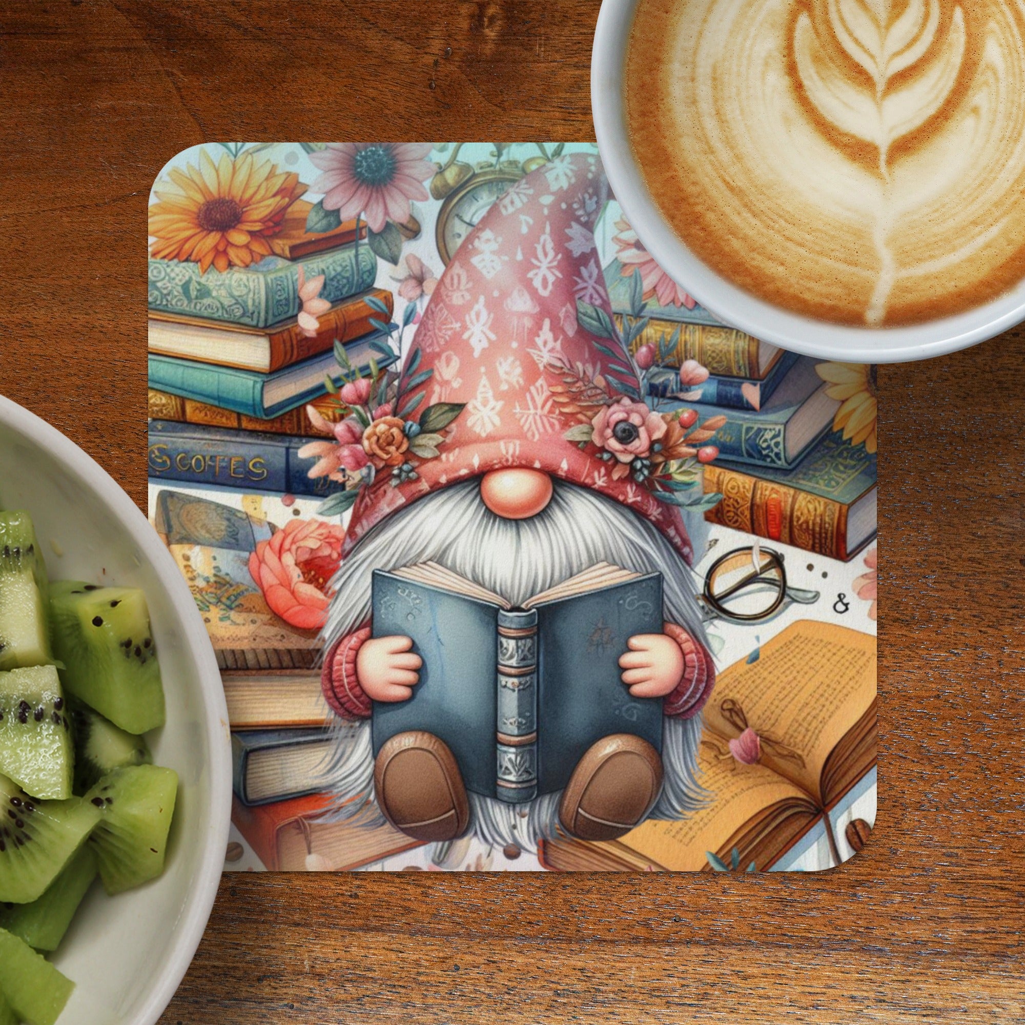 Gnome reading a book surrounded by flowers and stacked books.