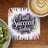 Coaster with "I will succeed today" text and watercolor floral design, next to coffee and kiwi.