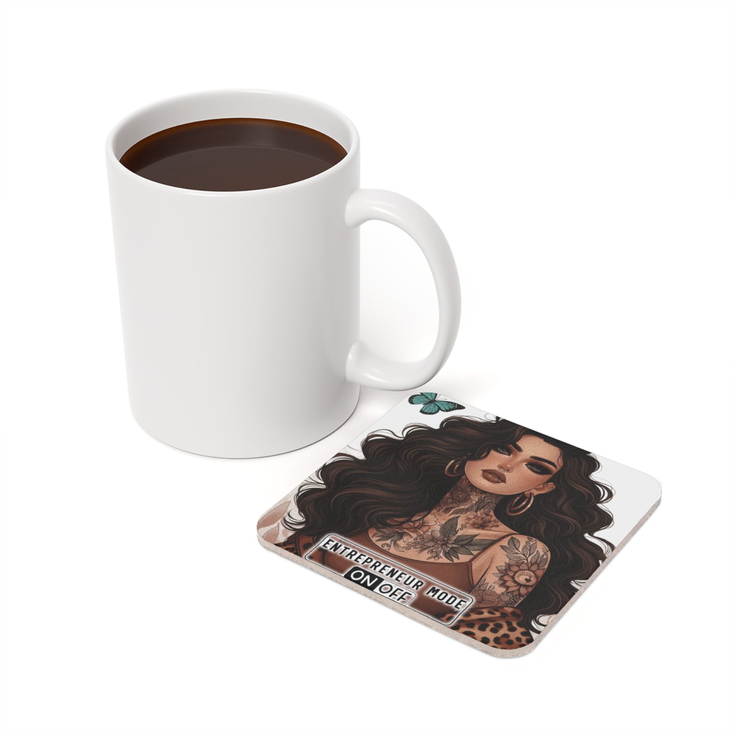 Mug of coffee next to a square coaster with "ENTREPRENEUR MODE ON OFF" text and a tattooed woman.