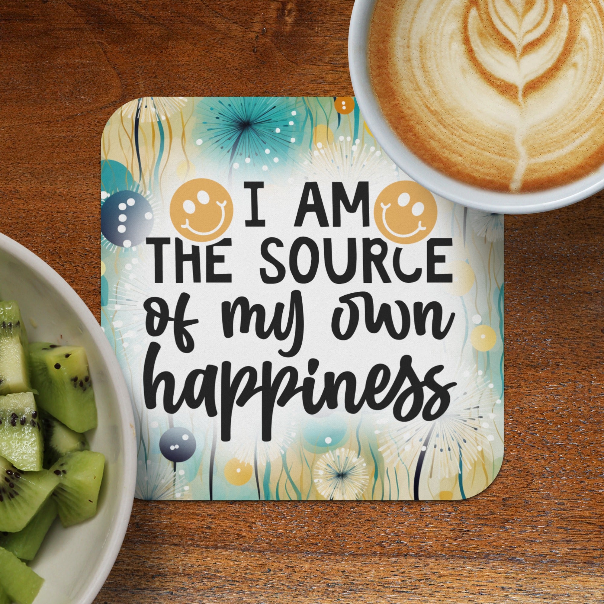 Coaster with "I AM the SOURCE of my own happiness" text and smiling emoji icons.