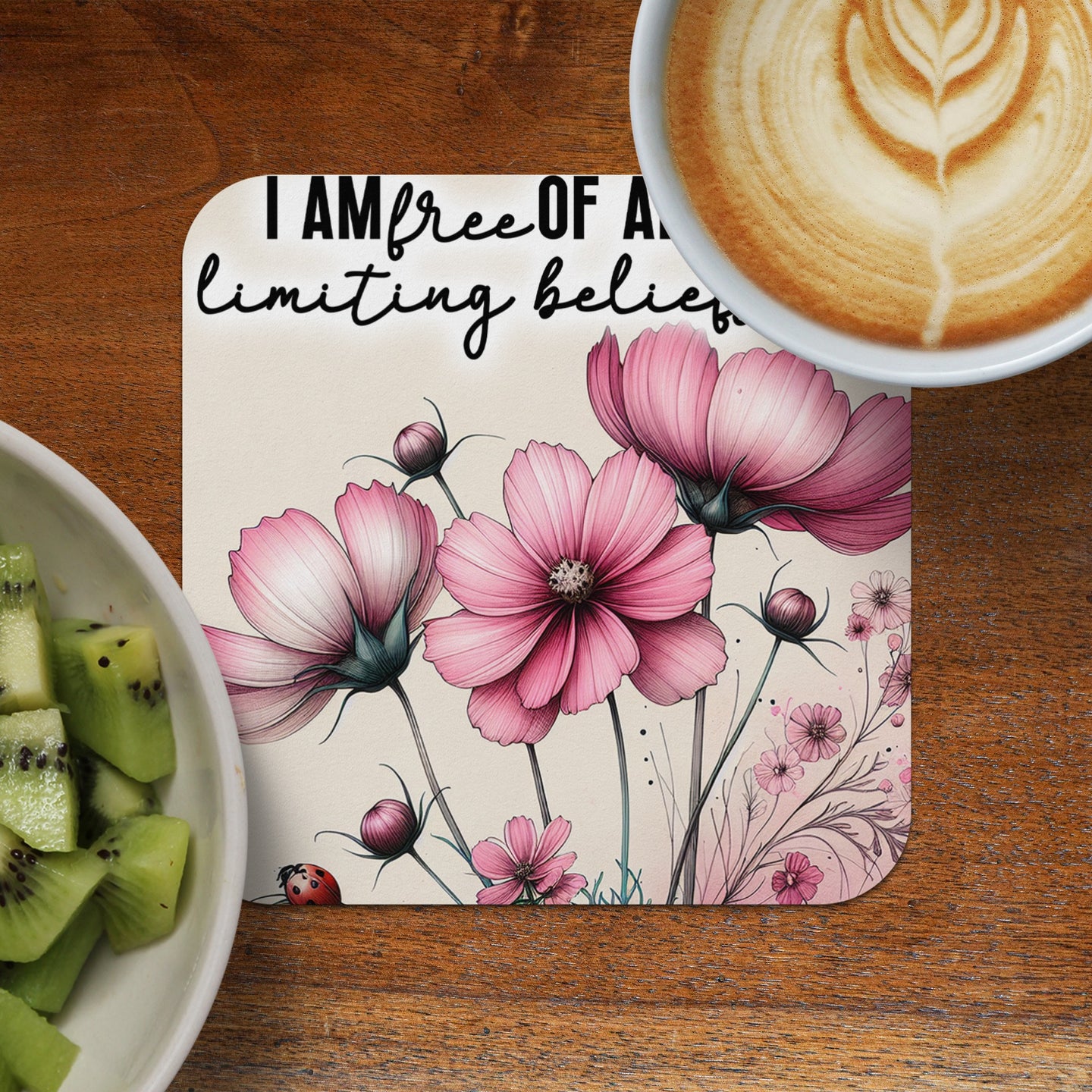 Coaster with pink cosmos flowers and quote "I am free of all limiting beliefs."