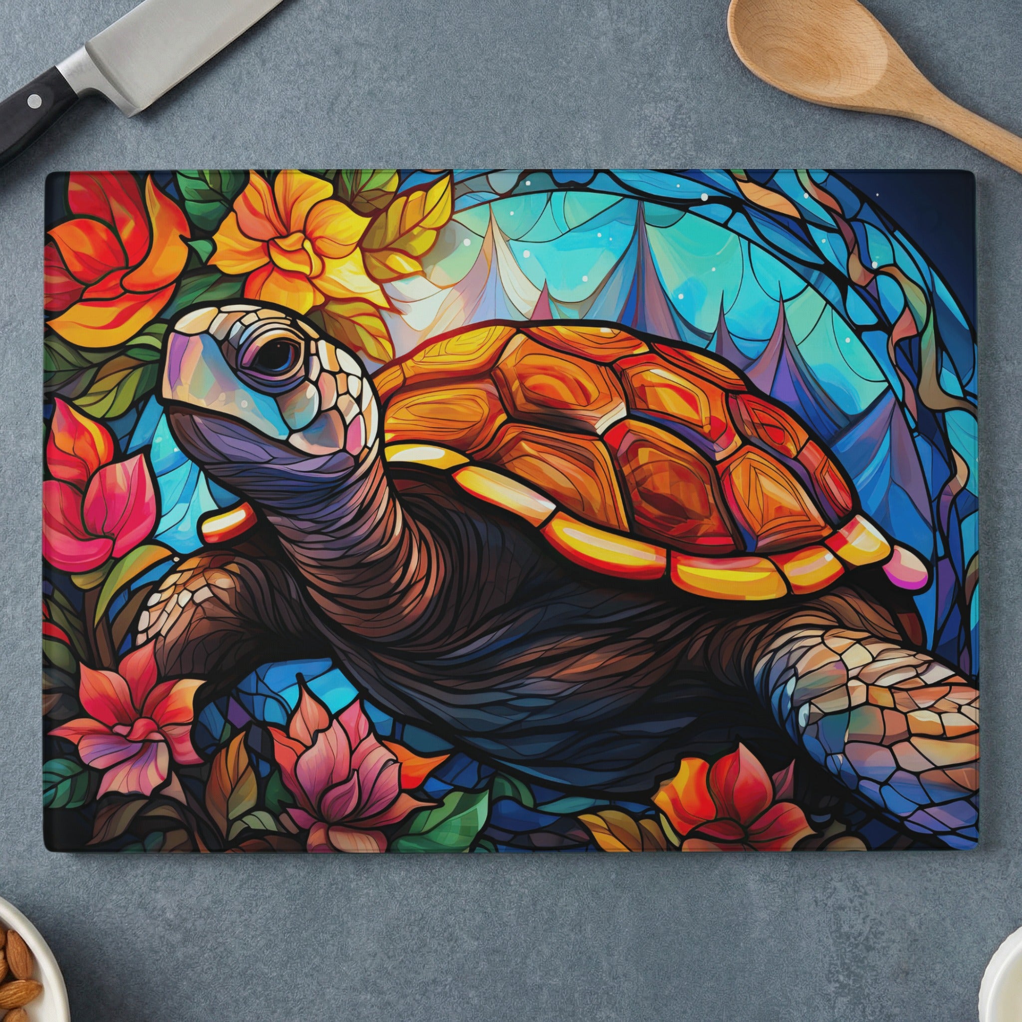 Sea turtle surrounded by vibrant flowers and blue, mountainous background.