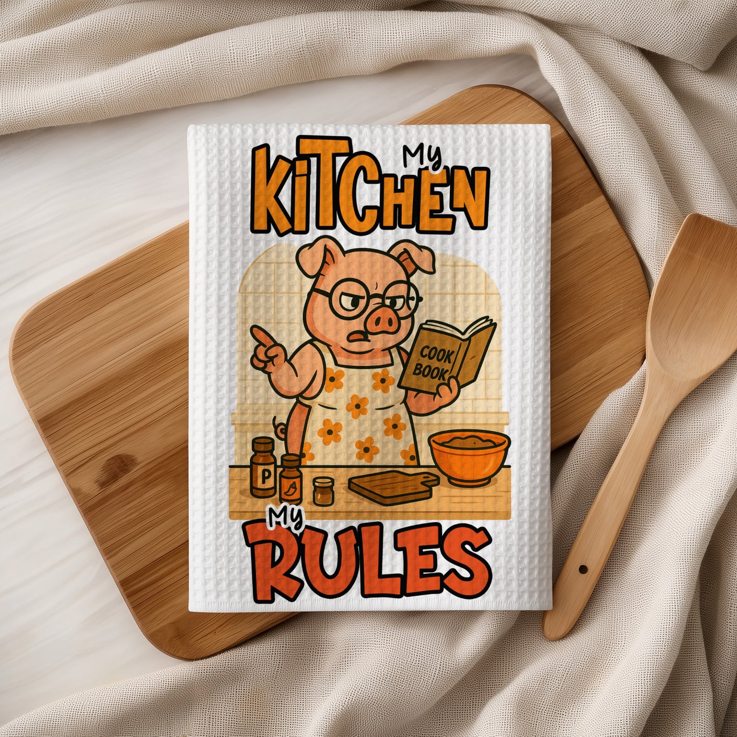 Pig wearing an apron holding a cookbook, "My Kitchen My Rules" text.