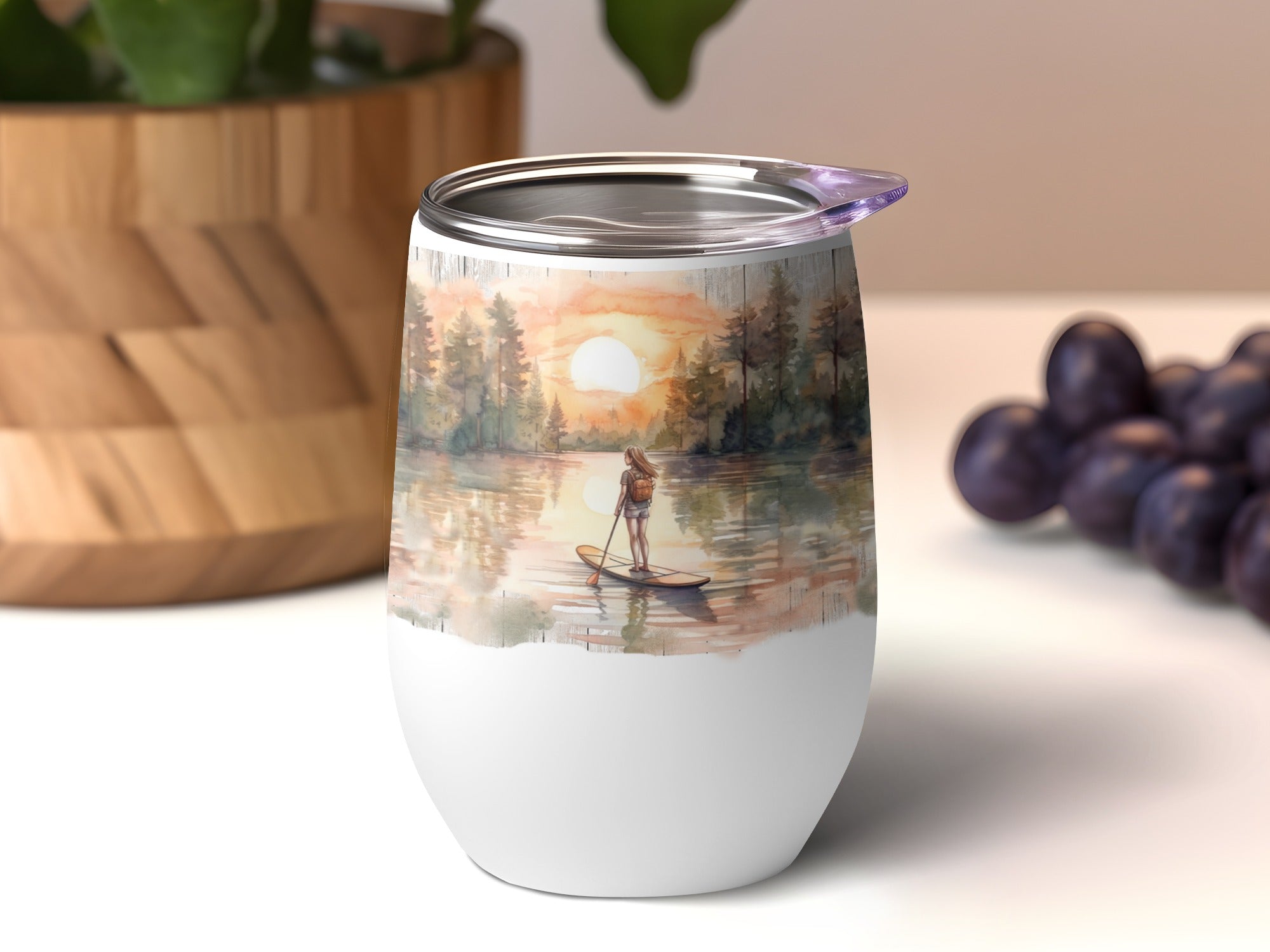 Wine tumbler with serene sunset paddleboarder scene.