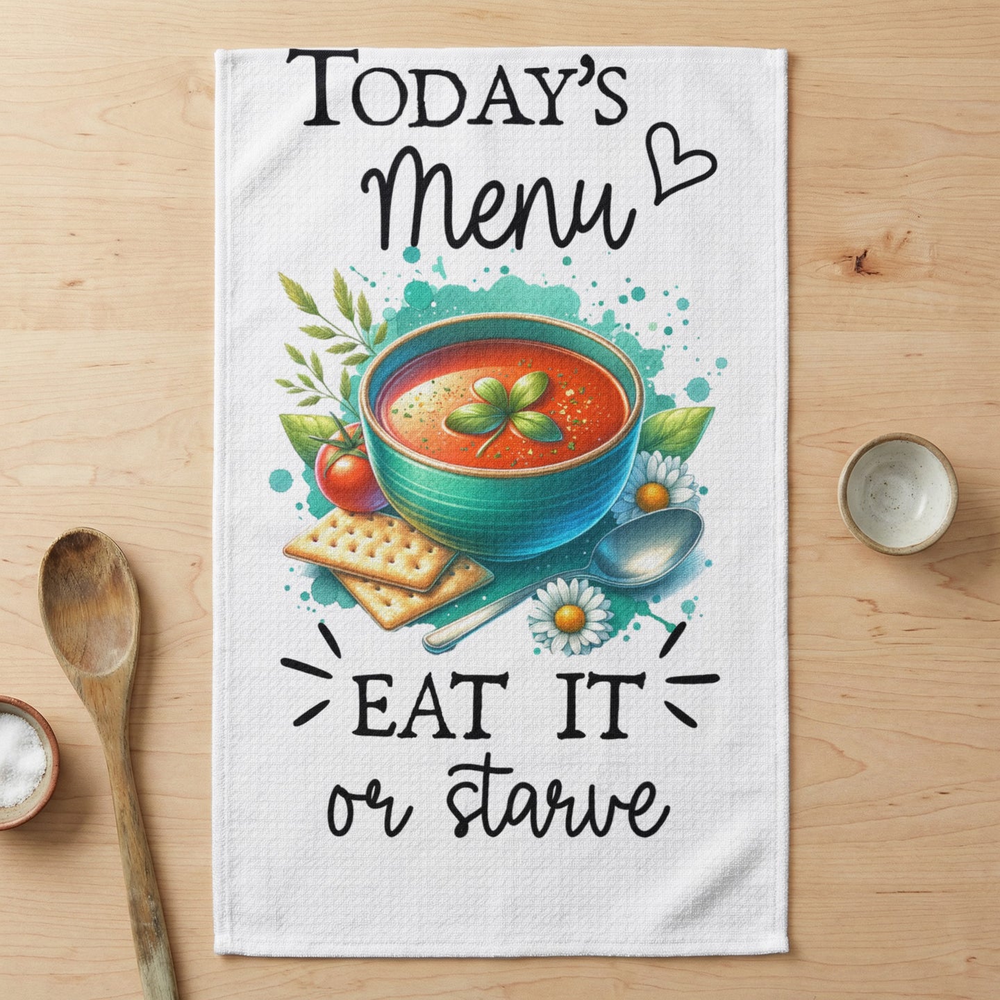 Bowl of tomato soup with crackers, spoon, and text "TODAY'S MENU Eat It or Starve".