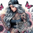 Woman with tattooed body and white hair, with butterflies and sunflowers.