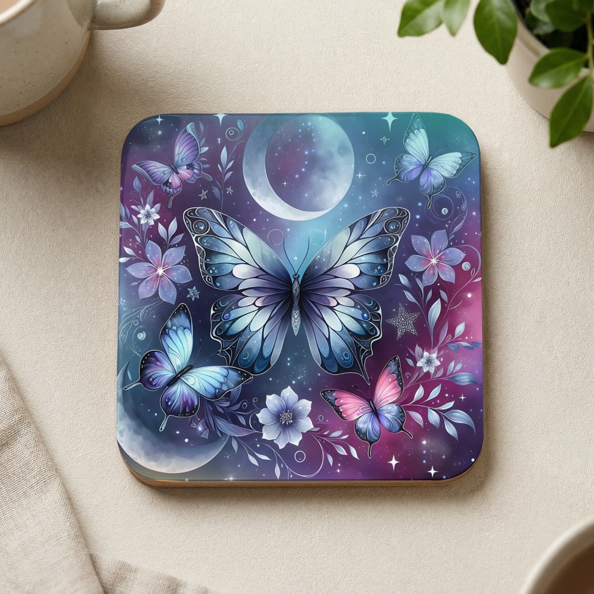 Glow-in-the-dark celestial butterfly coaster with moon and flowers.