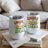 Two white tumblers with "Cheers to Bad Ideas" and beer mugs.