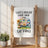 White kitchen towel with watercolor camper, sunflowers, and text "Life's better when your camping!"